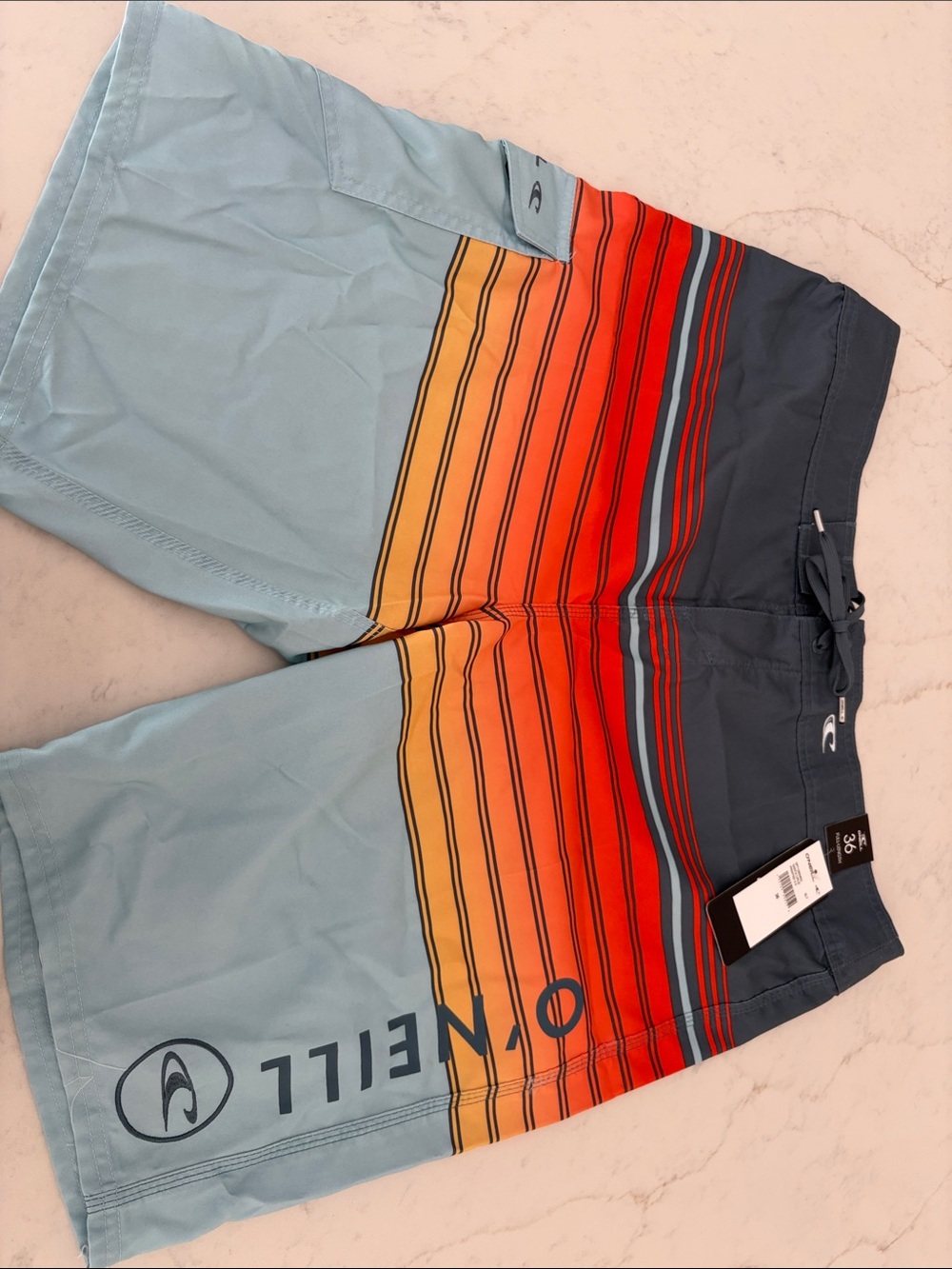 O'Neill Light Blue & Navy Stripe Board Shorts with Sunset Stripe